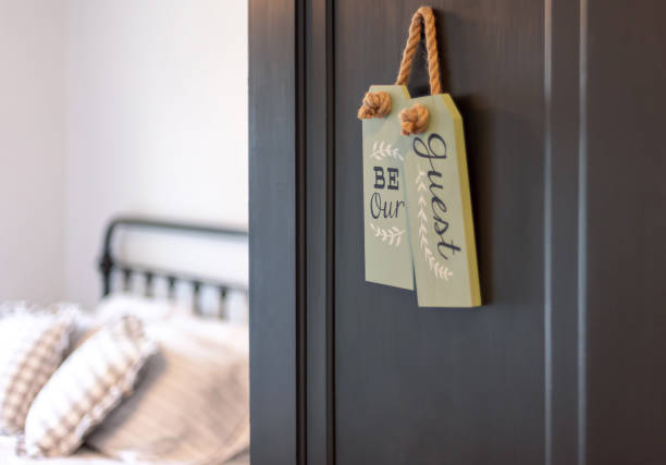 guest bedroom welcome note on door