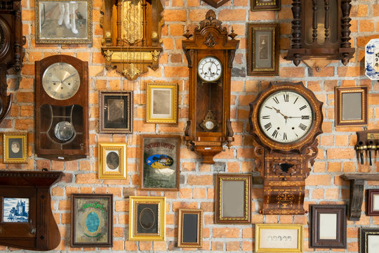 Antique Wall Clocks of different sizes on a awall