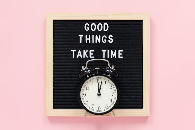 good things take time quote written on wall