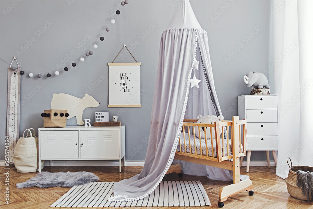 newborn bedroom with a curtain over bed