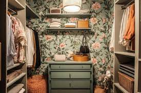 a closet with floral Wallpaper