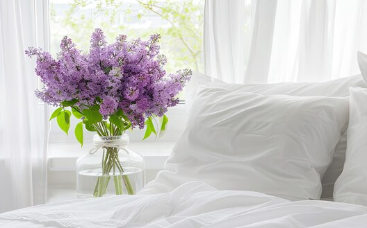 a beautiful Lilac flower on bed in vase